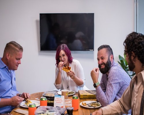 People sharing a meal together away from screens